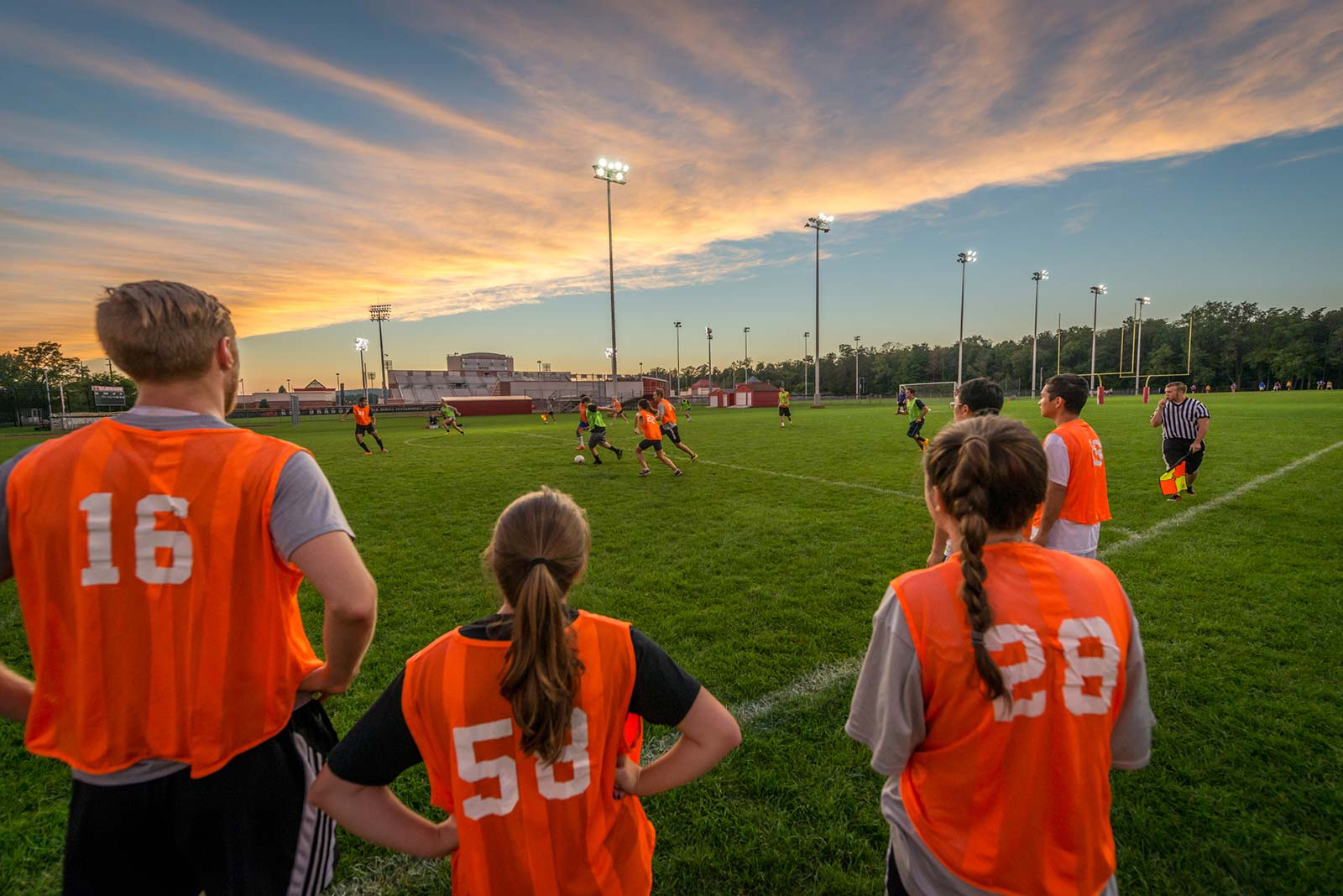 students playing recreational soccer