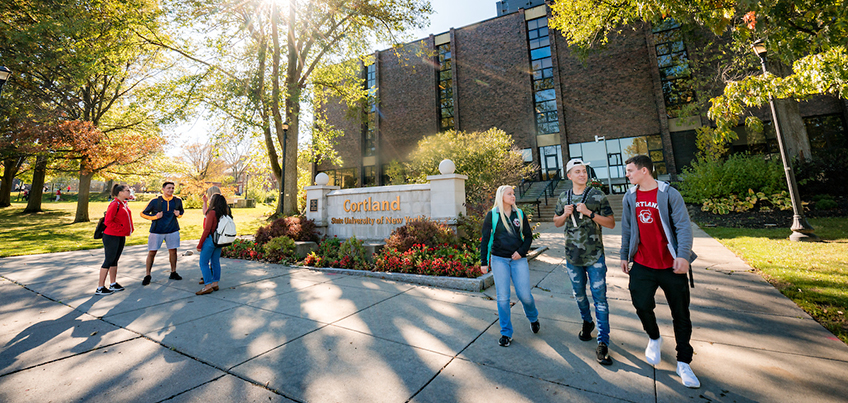 Students walking outside of Miller Building