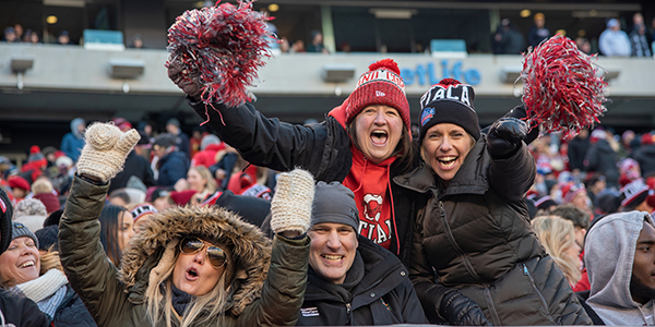 SUNY Cortland fans cheering at Cortaca game