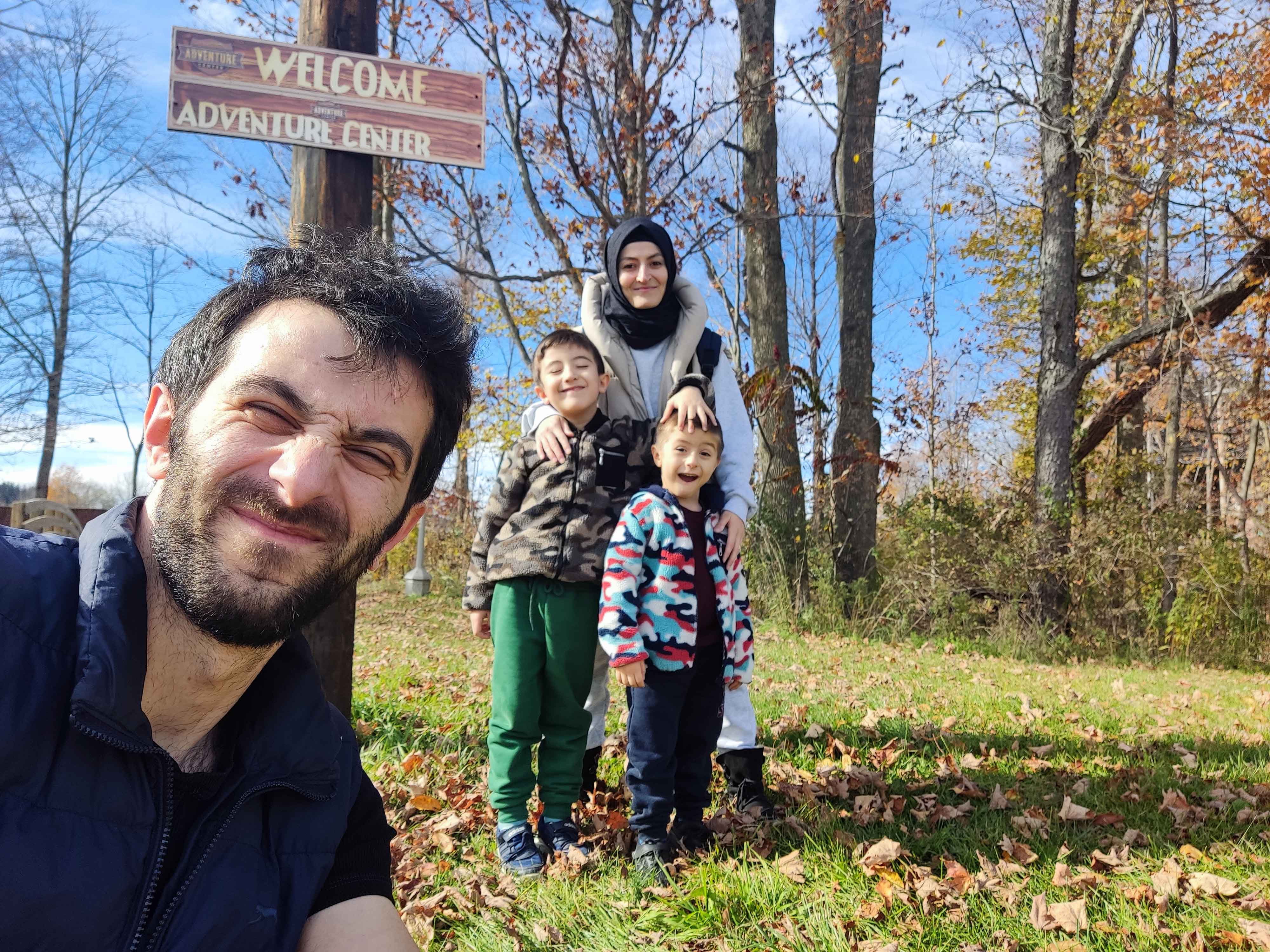 Student and family in background at Greek Peak Adventure Center