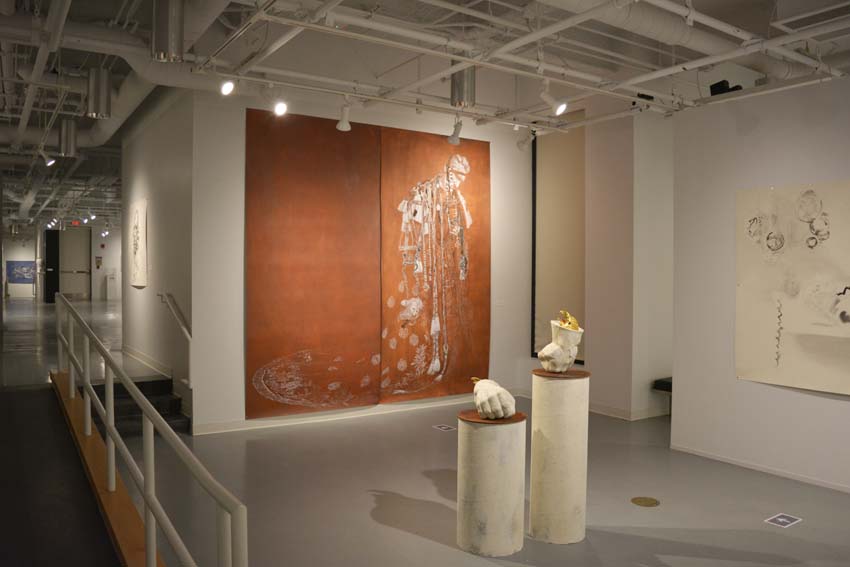 A view into the west gallery featuring Andrew Ellis Johnson's large-scale painting on paper and two cultured marble sculptures as part of the 'Founder' exhibition.