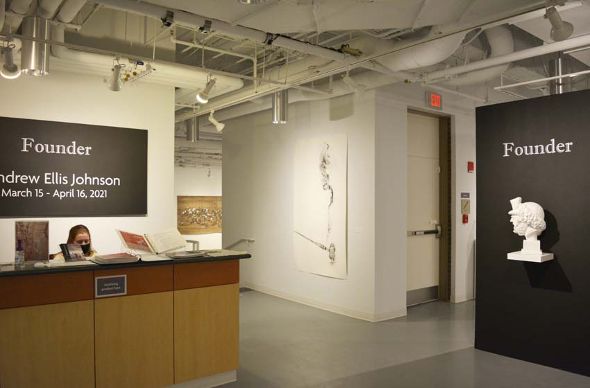 A view of the title wall at the reception area and into the central gallery featuring Andrew Ellis Johnson's works on paper and cultured marble sculptures as part of the 'Founder' exhibition.