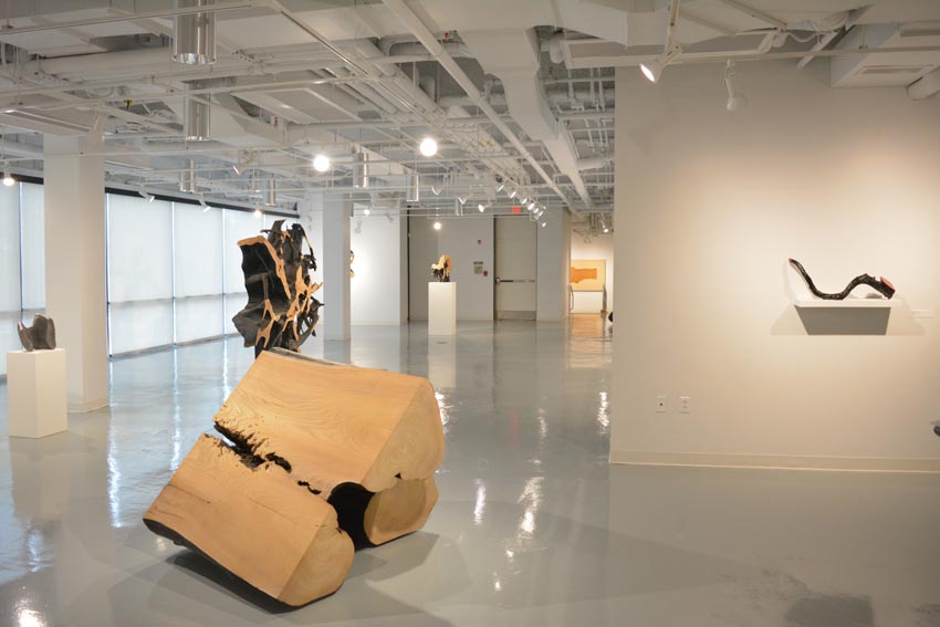 View into the central gallery at Dowd Gallery featuring sculptural objects produced by Ithaca-based sculptor Jack Elliott.