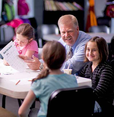 Professor Tim Davis with children